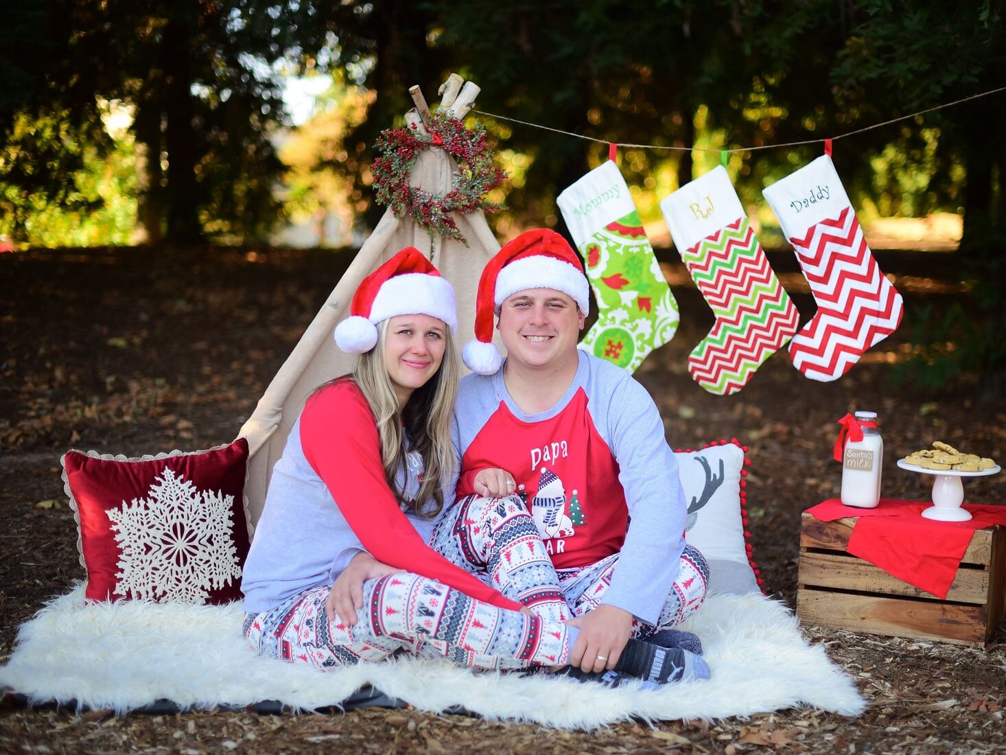 Christmas card ideas that take place outside in front of a tent | The Dating Divas