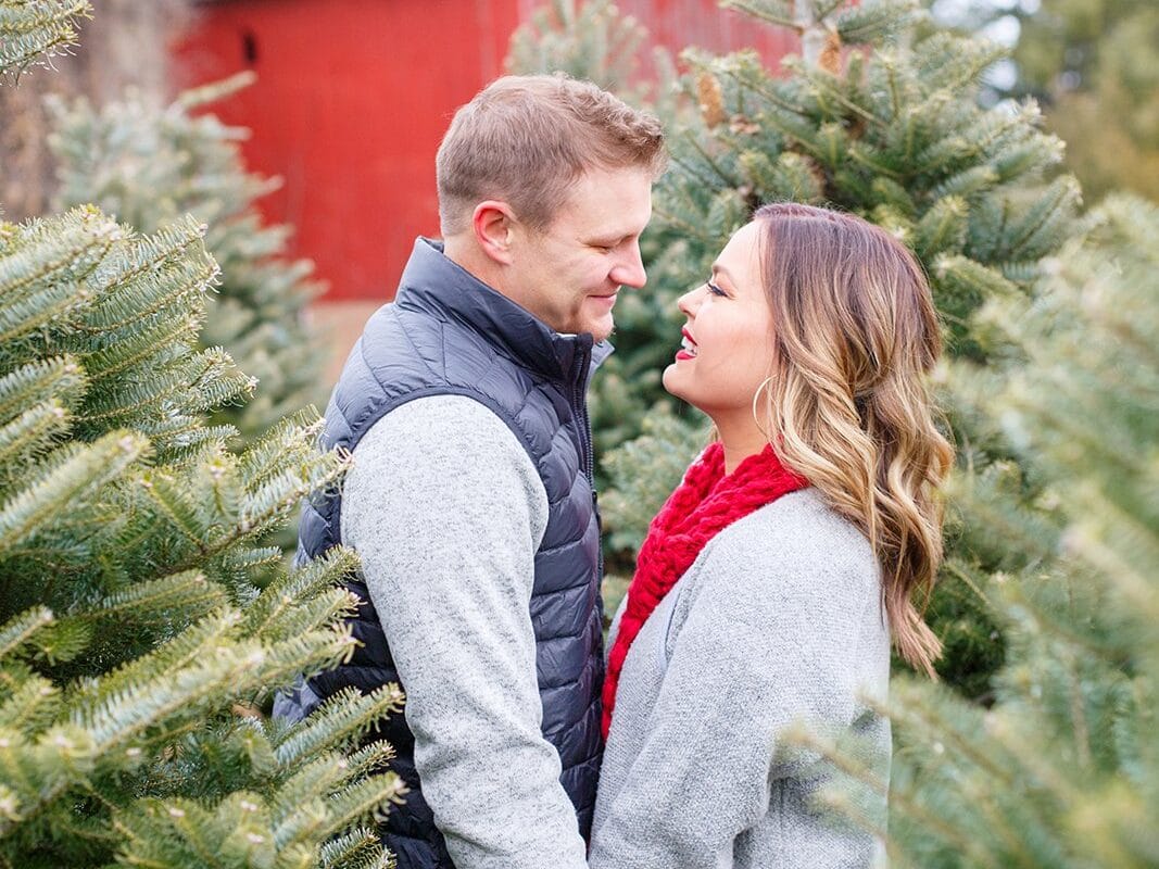 Romantic Christmas cards ideas for couples at a Christmas tree farm | The Dating Divas